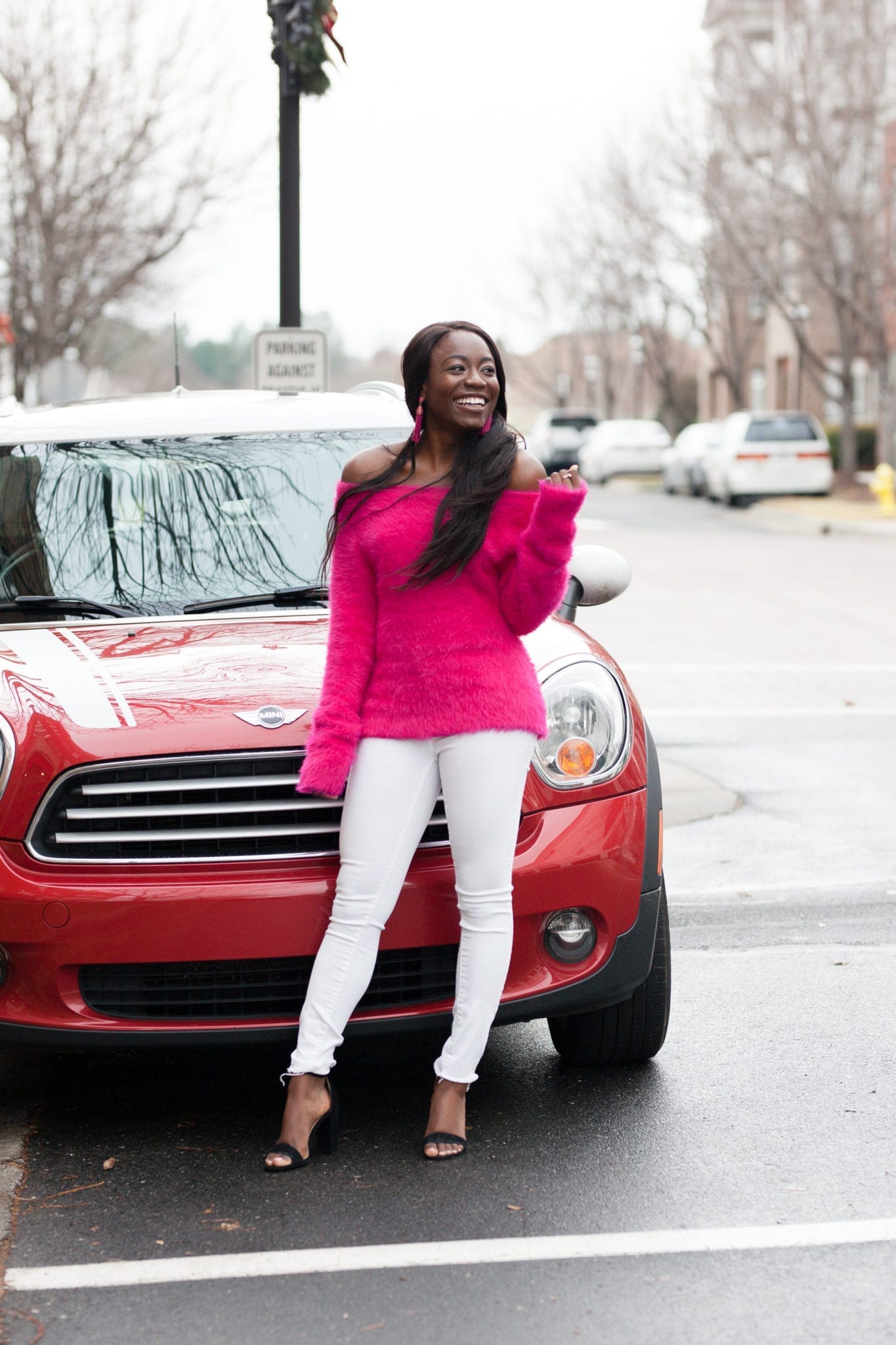 Hi! I'm Tomi. I'm a southern fashion and lifestyle blogger who loves color. Check out this fuzzy, pink sweater from the Loft! It's super soft and can be worn standard and off the shoulder. Check out the blog post to shop! GoodTomiCha.com