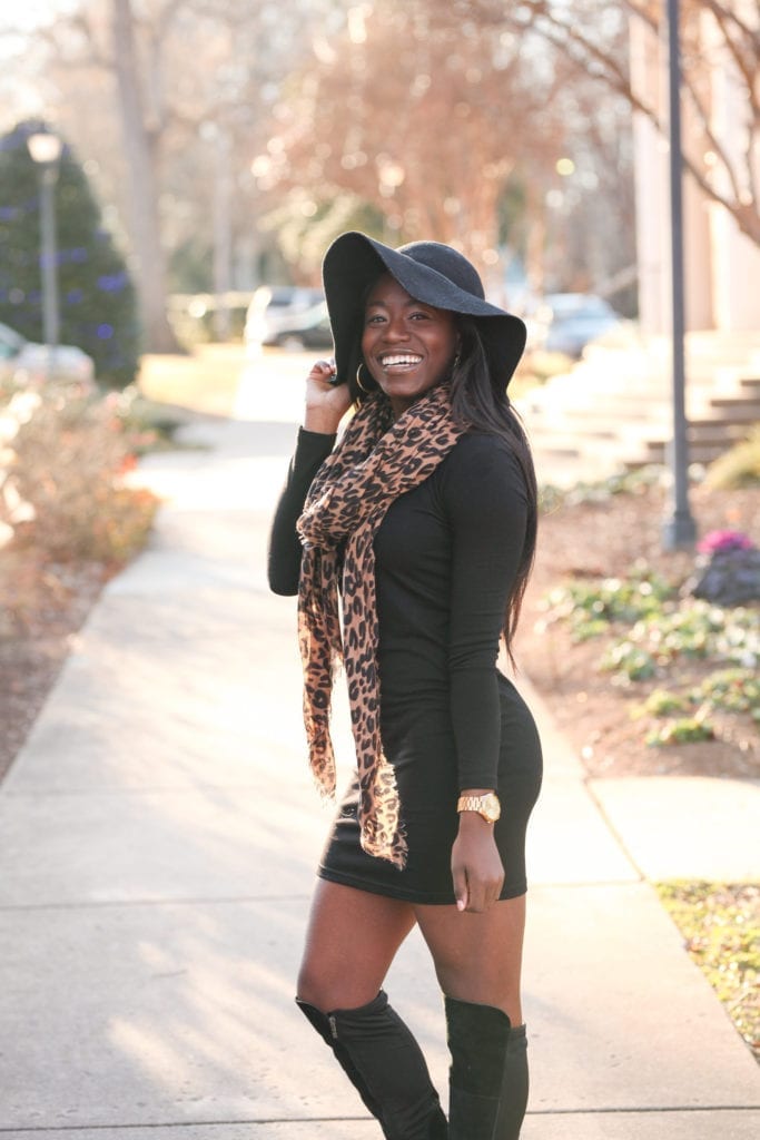 Greenville Fashion Blogger, GoodTomiCha, shares her tips on how to style little black dresses in the winter. This LBD is perfectly paired with leopard scarf and over the knee boots. Grab this under $50 find and read the rest of her tips on the blog! 
