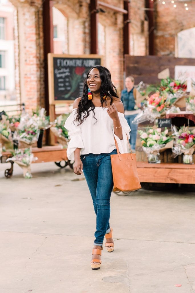 Black fashion blogger, Tomi Obebe, shares her top must-haves for spring. | Shot in Greenville, South Carolina Wyche Pavilion by Chelsey Ashford Photography featuring the top spring trends of the season. 