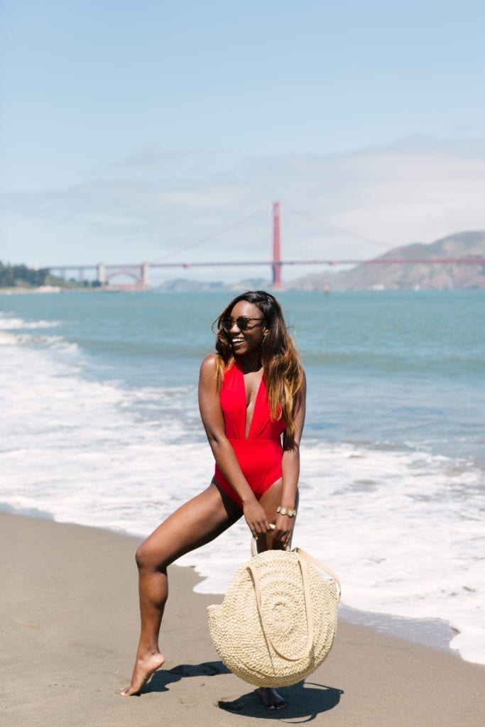 July 4th swimsuits on the blog! All styles under $50 including this circle tote and red one piece. Sparklers won't be the only thing sizzling this July hehe. // GoodTomiCha // #sanfranciscoblogger #goldengatebridge #summertrends #4thofjuly