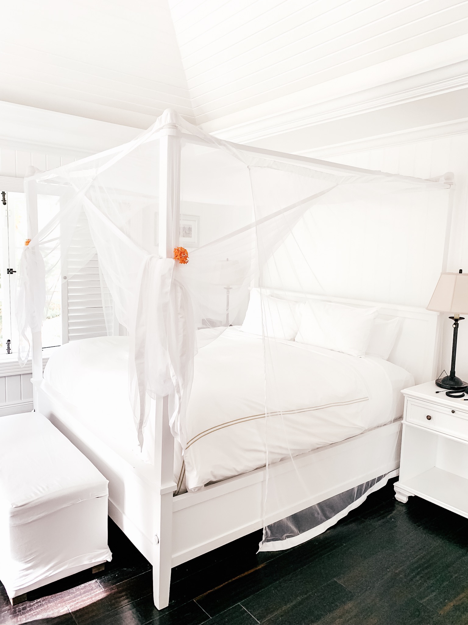 Gorgeous white canopy bed give the perfect tropical feel at Sugar Beach
