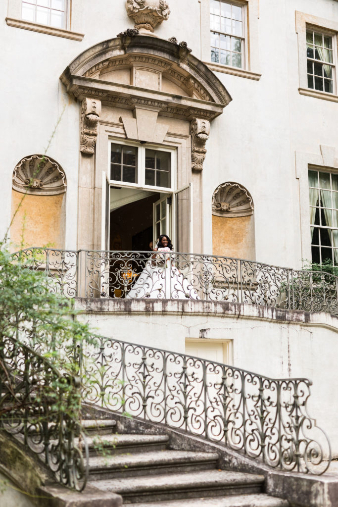 Elegant southern wedding with bride entering down the steps into the ceremony | Swan House Gardens