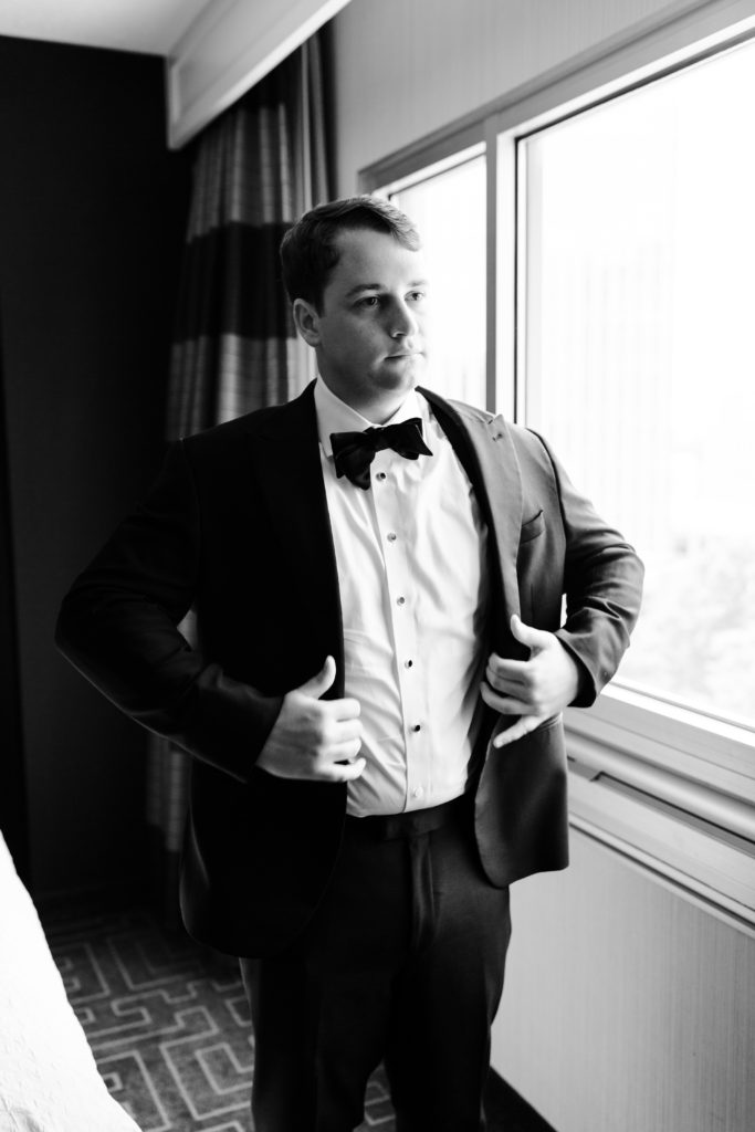 Black and white groom photo, getting ready photos, wedding photos, tux by the black tux, 