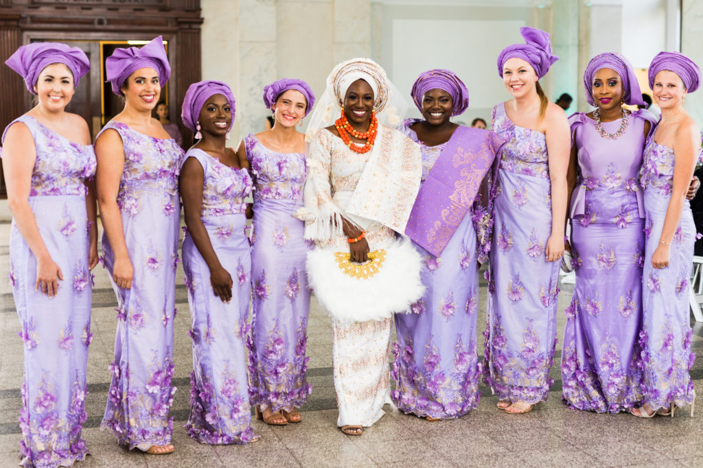 Nigerian bridesmaids in purple dresses