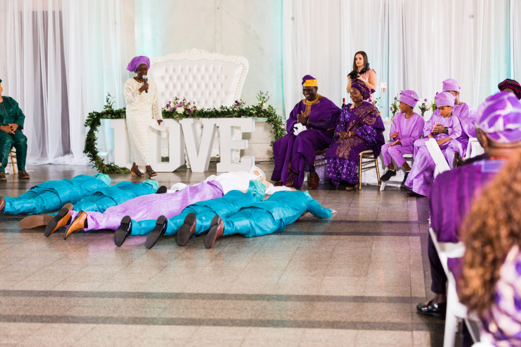 Groom asking for the parent's blessing at a Nigerian engagement ceremony 