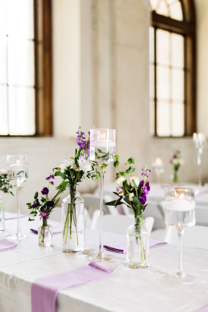 simple purple wedding decor with candles
