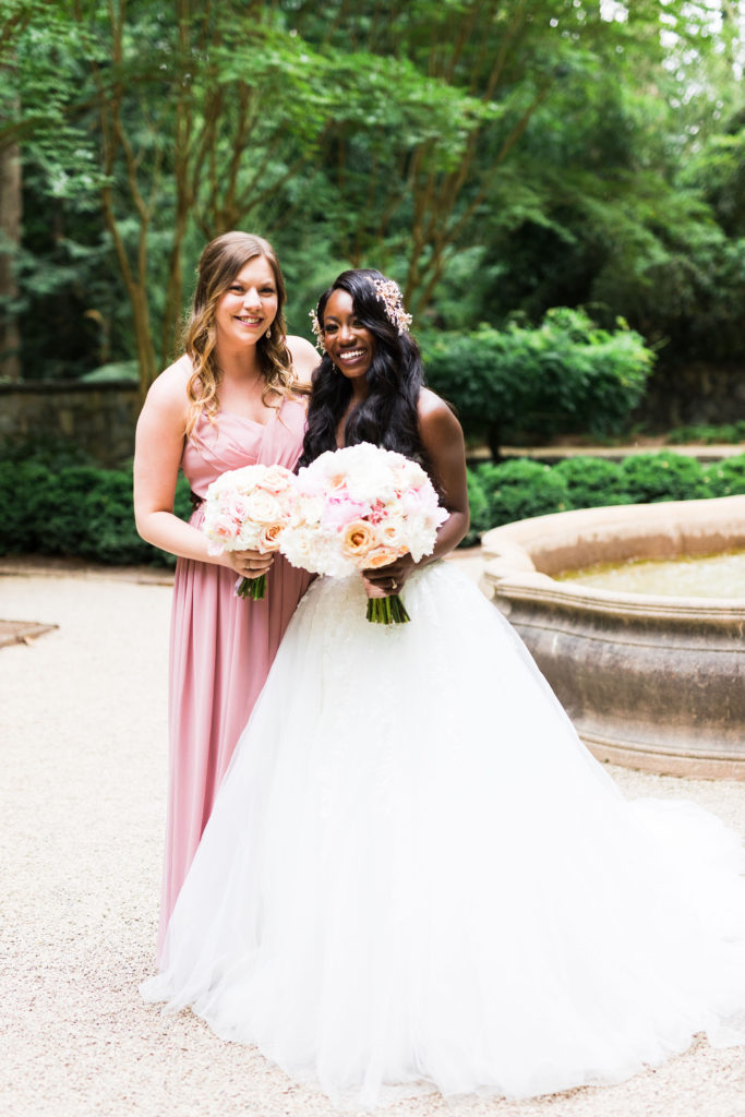 Bffs since childhood, bride and bridesmaid pose for photos on wedding day in Atlanta