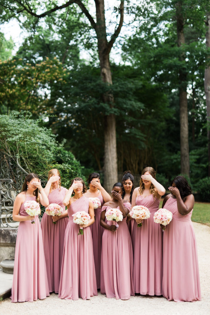 Bridesmaids covering their eyes in preparation for their first look of the bride | Atlanta History Center wedding | Dusty rose azazie dresses | GoodTomiCha.com for the full vendor list
