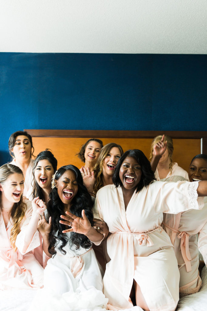 Blogger Tomi Obebe shares her getting ready photos and FAQs on all things bridesmaids on the blog | bridesmaid robes: Etsy | bridal robe and chemise: BHLDN