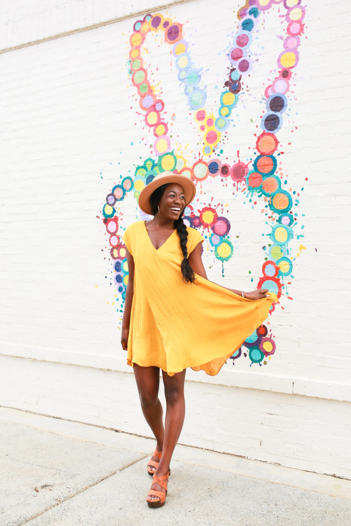 Yellow pleated mini dress for fall styled by Charlotte lifestyle blogger, GoodTomiCha