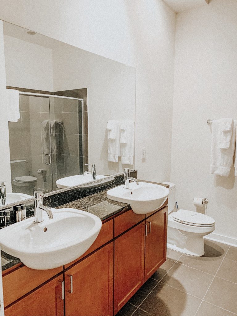 Double-vanity hotel bathroom 