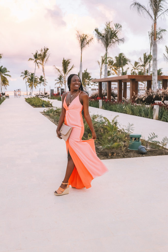 Top Lifestyle blogger, GoodTomiCha wearing a two-toned pink maxi dress in the Dominican Republic in hyatt zilara cap cana 