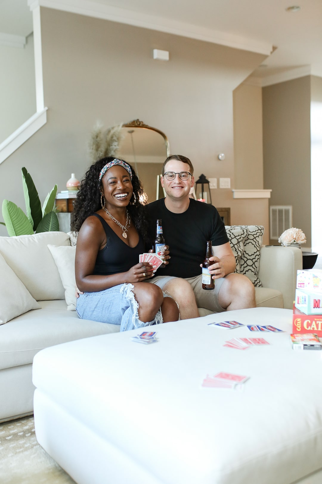 man and woman playing games at home for date night
