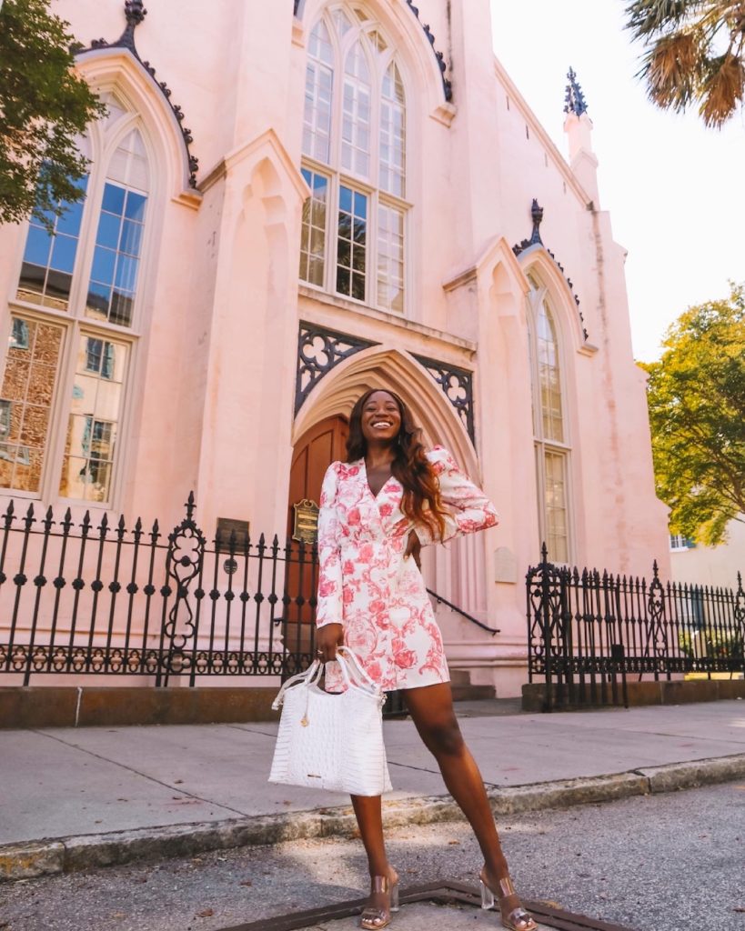 woman wearing floral dress outside church for Charleston Trip Recap 
