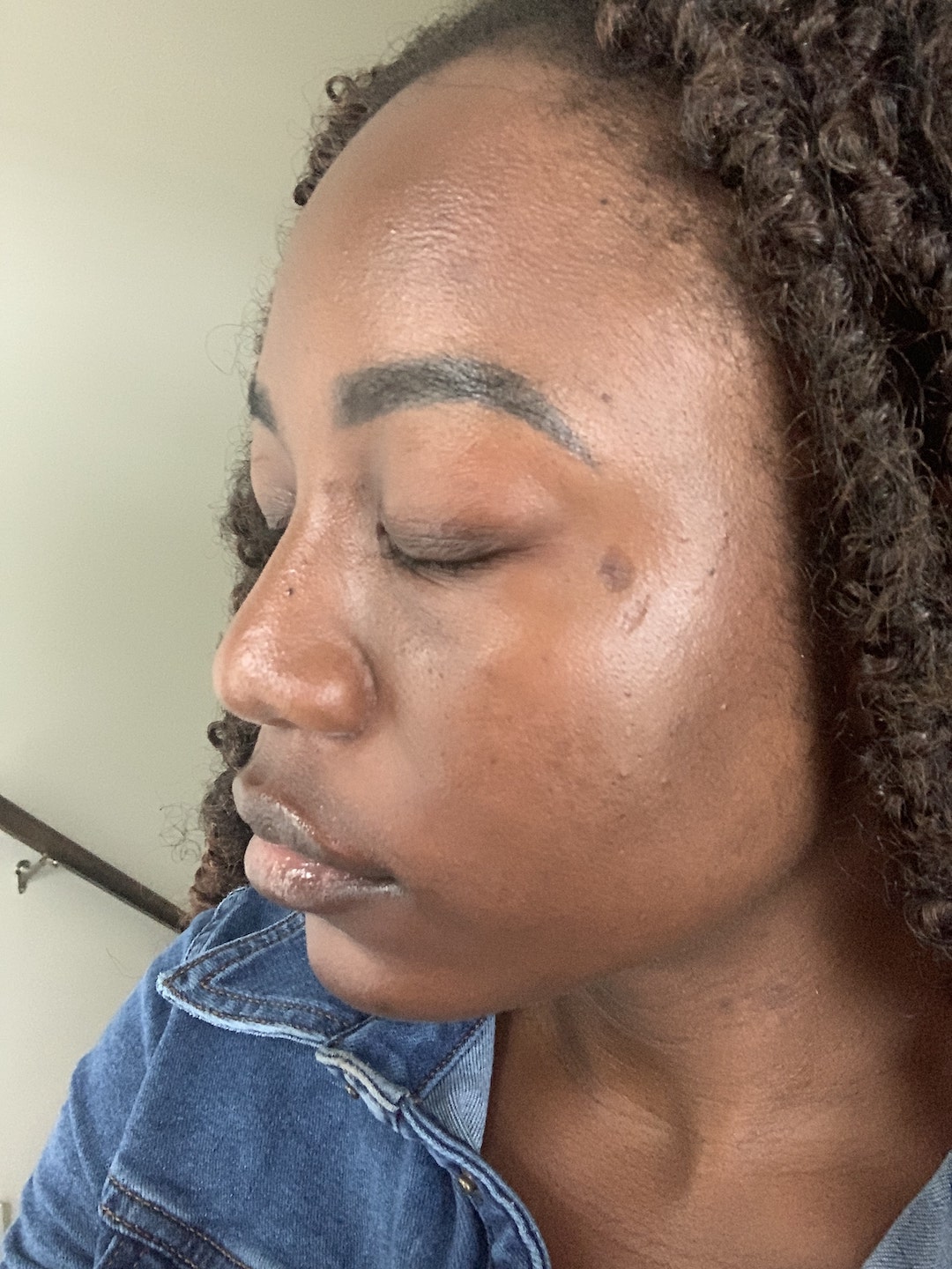woman showing her face after getting a facial at toska spa