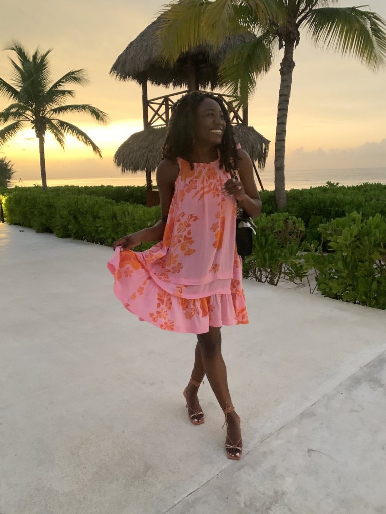 woman wearing a pink and orange dress in Jamaica