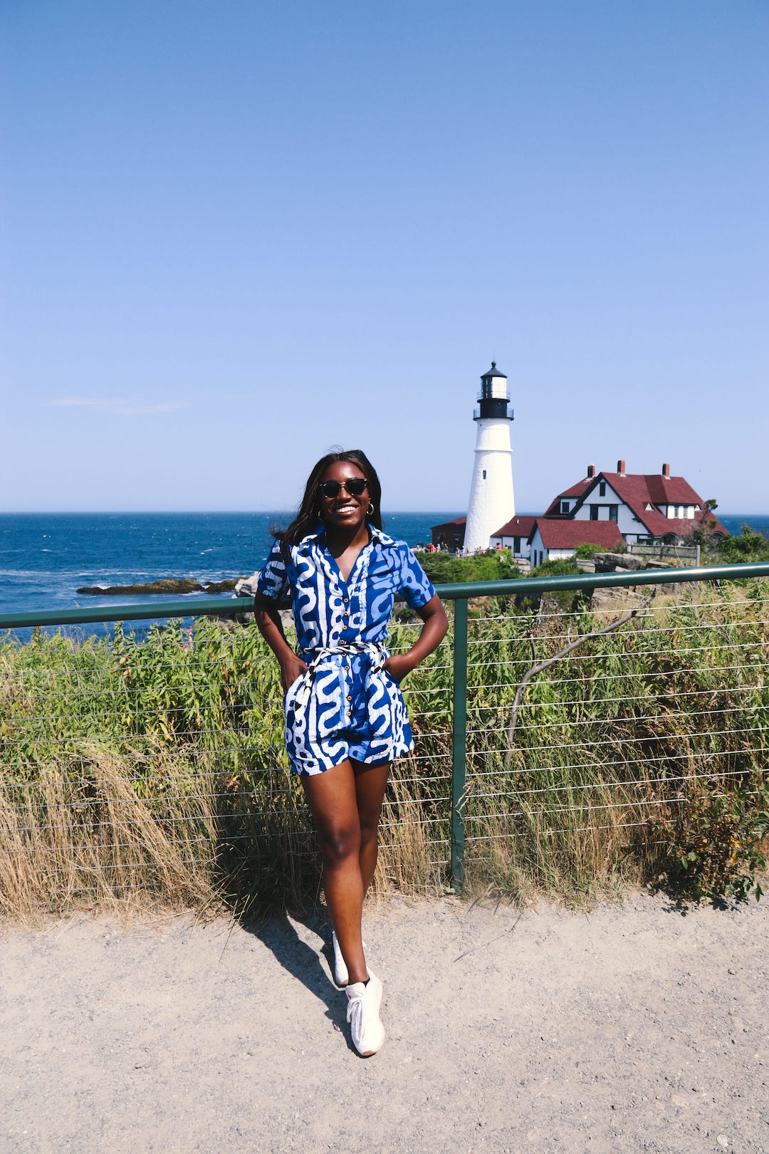 woman wearing blue and white romper in Maine