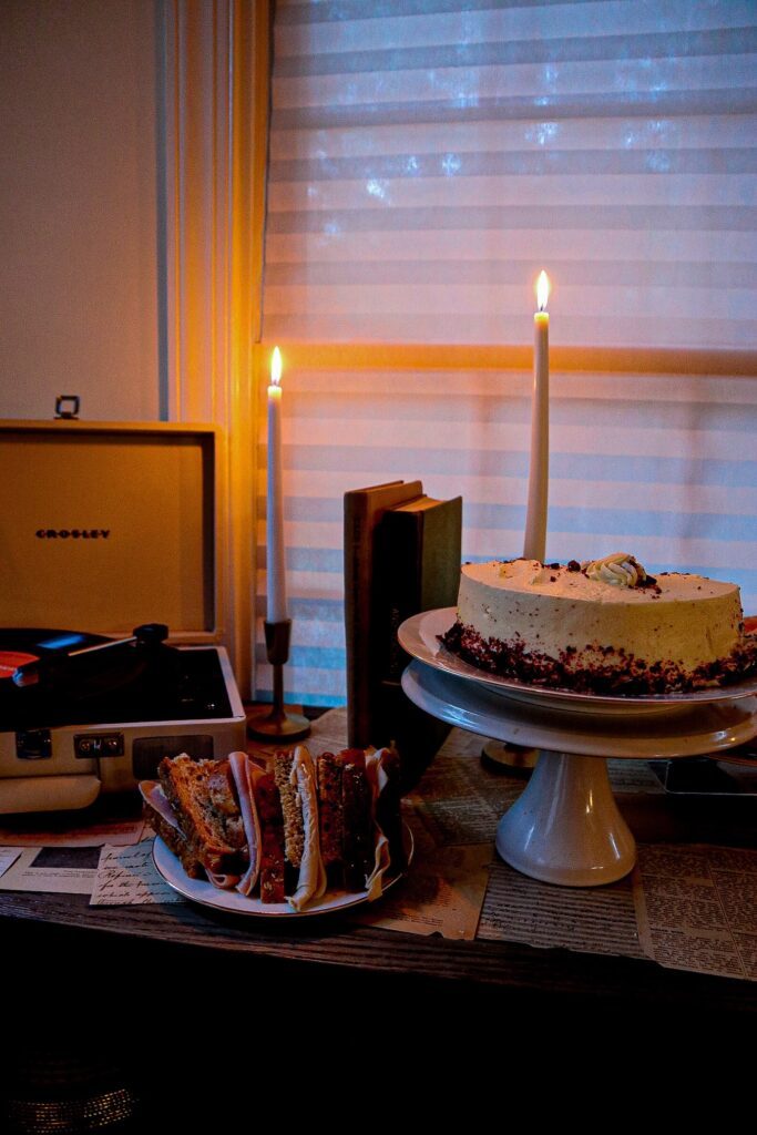 red velvet cake surrounded by candlelight for fall dinner party | goodtomicha.com