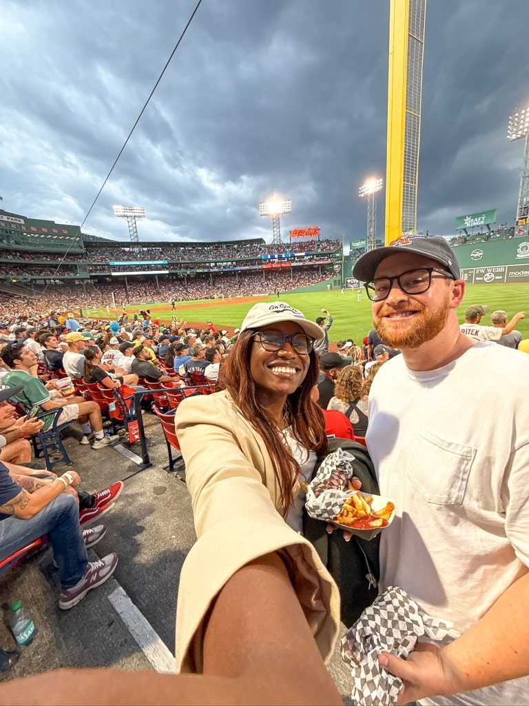Fans cheering at Fenway Park during a Boston Red Sox vs New York Yankees game | Things to Do in Boston on GoodTomiCha.com