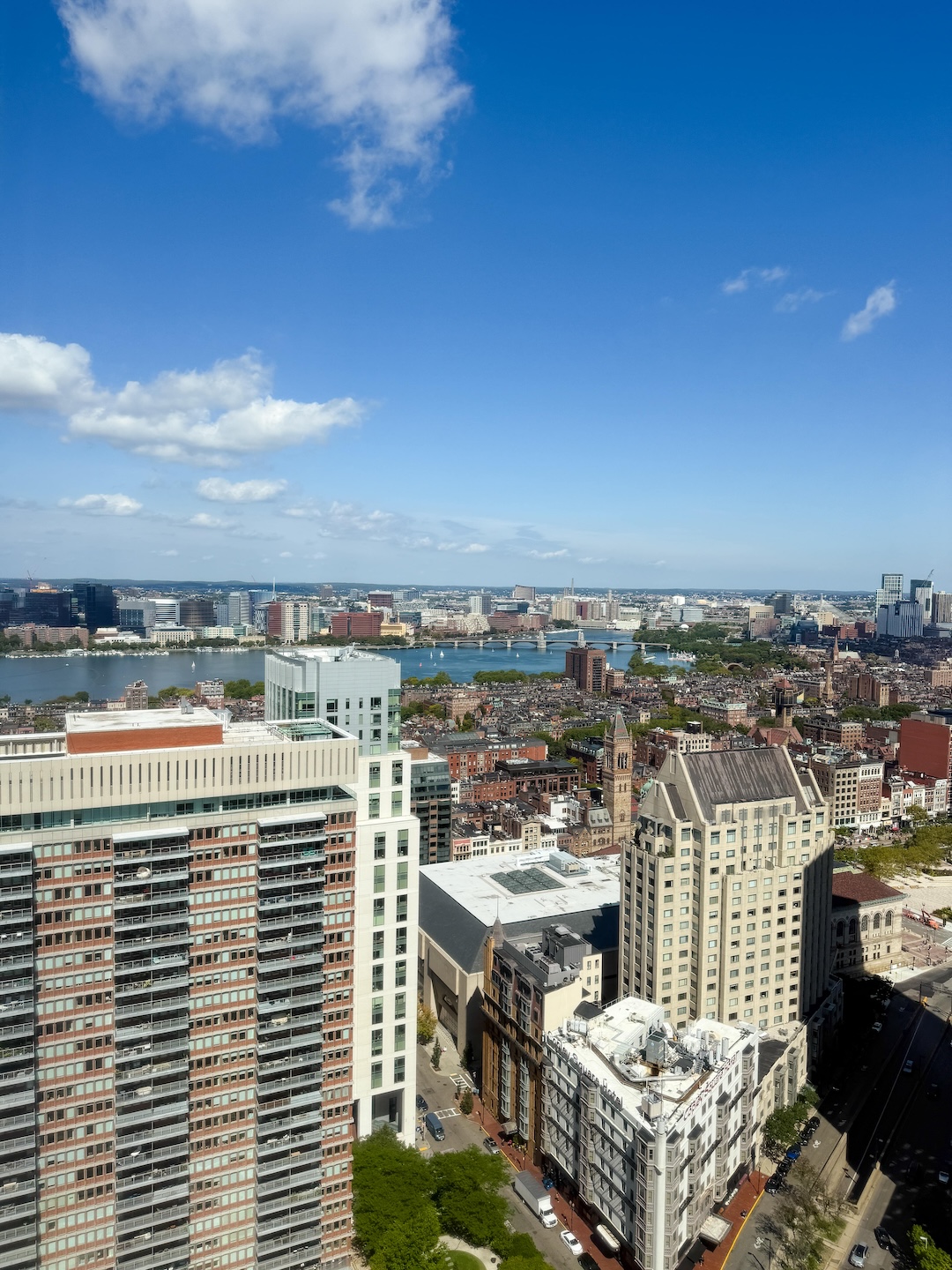 View of Boston skyline from Boston Marriott Copley Place hotel room window including the river | GoodTomiCha.com